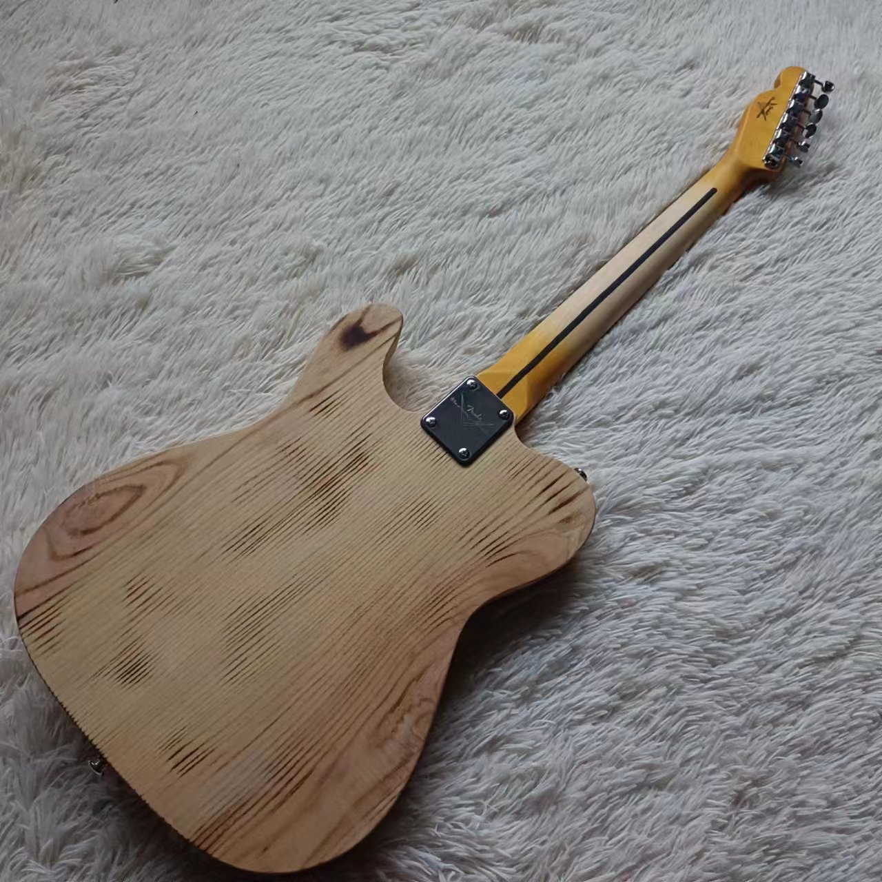 مصنع صيني ينتج جيتار خشبي طبيع - مراجعة Bass Guitar Fretless وسعره